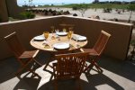 Patio dining with views of the golf course and beach